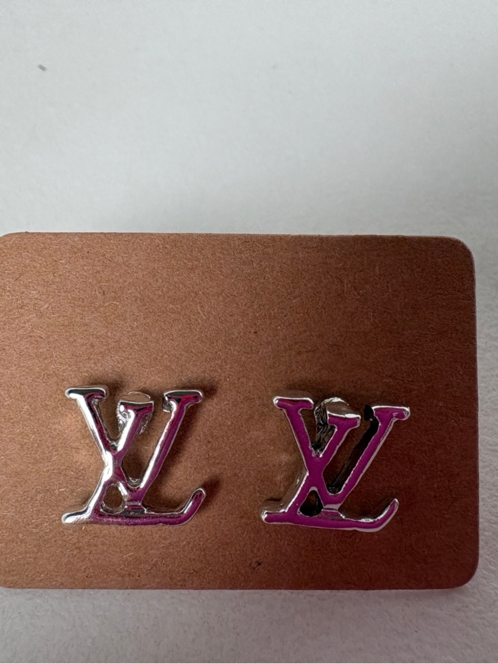 Silver LV studs